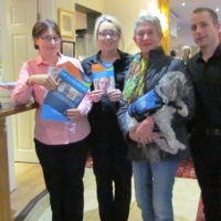 Volunteer Mary O'Brien with staff in Drummond Hotel, Ballykelly