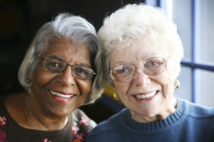 Two older ladies smiling