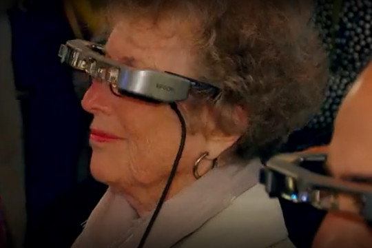 woman wearing subtitling mixed reality glasses