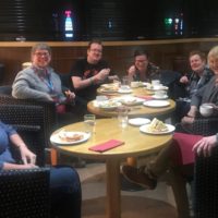 Hearing Link volunteers enjoy pizza evening - Northern Ireland