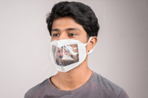 man wearing a transparent face mask