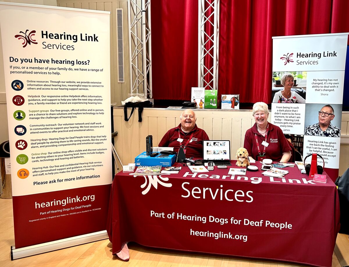 Hearing Link Services volunteers at an information event