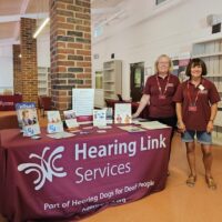 Peer support volunteers provide information and advice at our Hearing Loss Community Days